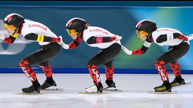 Team Canada is led by Isabelle Weidemann, followed by Valerie Maltais, centre, and Ivanie Blondin, right, as they compete in the women's team pursuit quarterfinals speedskating race at the 2026 Winter Olympics, in Milan, Italy, Saturday, Feb. 14, 2026. (Ben Curtis/AP Photo)