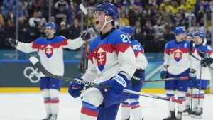 Slovakia's Juraj Slafkovsky celebrates end of a preliminary round match of men's ice hockey between Sweden and Slovakia at the 2026 Winter Olympics, in Milan, Italy, Saturday, Feb. 14, 2026. (Petr David Josek/AP)