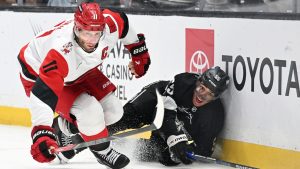 Carolina Hurricanes centre Jordan Staal (11) battles Los Angeles Kings right wing Quinton Byfield (55) for the puck during the second period of an NHL hockey game Saturday, October 18, 2025, in Los Angeles. (Wally Skalij/AP)