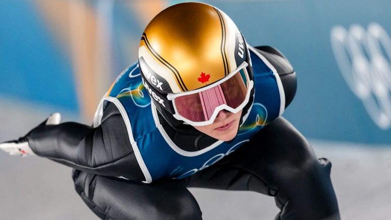 Abigail Strate, of Canada, goes down the ramp during her trial jump of the ski jumping women's normal hill individual, at the 2026 Winter Olympics, in Predazzo, Italy, Saturday, Feb. 7, 2026. (Matthias Schrader/AP Photo)