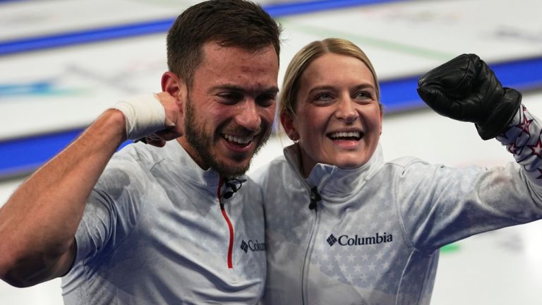 United States' Korey Dropkin and Cory Thiesse react following their semi-finals round of the mixed doubles curling match against Italy, at the 2026 Winter Olympics, in Cortina d'Ampezzo, Italy, Monday, Feb. 9, 2026. (Fatima Shbair/AP Photo)