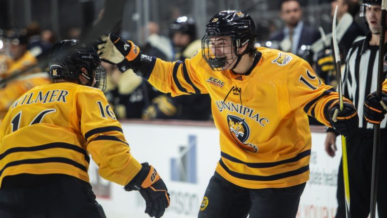 Quinnipiac Bobcats forward Ethan Wyttenbach (right) celebrates a goal. (Quinnipiac Athletics photo)