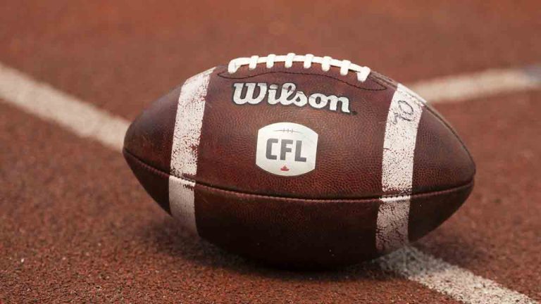 Canadian Football League logo seen on a football during CFL training camp at Alumni Stadium in Guelph, Ont., Sunday, May 12, 2024. (Nick Iwanyshyn/CP)