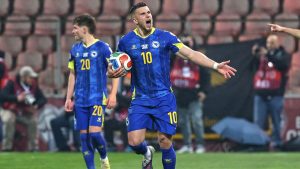 Bosnia's Ermedin Demirovic celebrates after Bosnia's Haris Tabakovic scored his side's first goal during the World Cup qualifying playoff final soccer match between Bosnia and Italy in Zenica, Bosnia, Tuesday, March 31, 2026. (Armin Durgut/AP)