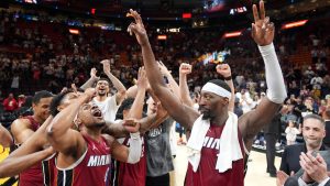Miami Heat centre Bam Adebayo, right, celebrates with teammates after he scored 83 points, the second-highest single game total in NBA history, in an NBA basketball game against the Washington Wizards, Tuesday, March 10, 2026, in Miami. (Rebecca Blackwell/AP)