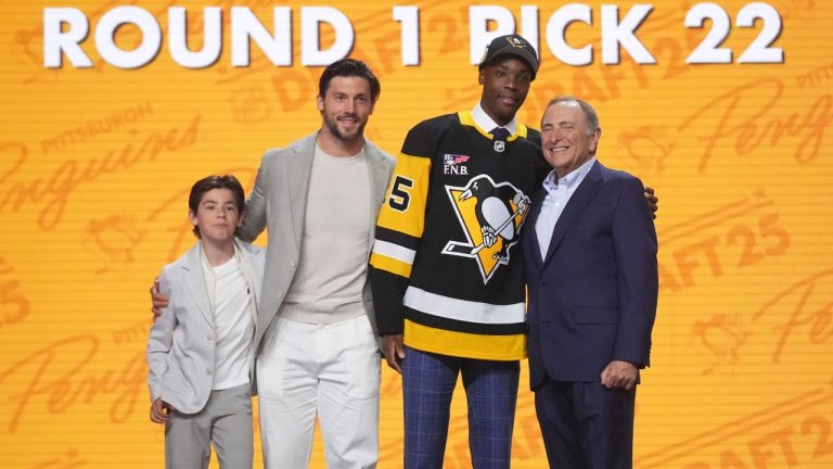 Bill Zonnon stands with Kris Letang, his son, Alex Letang and NHL commissioner Gary Bettman after being drafted by the Pittsburgh Penguins during the NHL draft Friday, June 27, 2025, in Los Angeles. (AP/Damian Dovarganes)