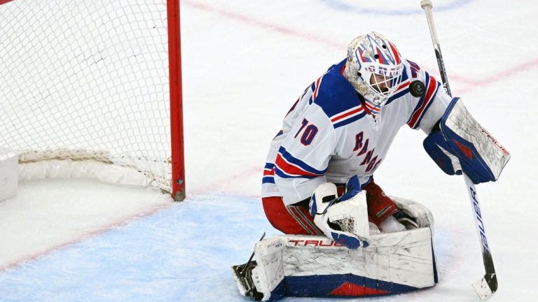 New York Rangers goalie Louis Domingue makes a save during the third period of an NHL hockey game against the Chicago Blackhawks, Sunday, Jan. 5, 2025, in Chicago. (Paul Beaty/AP)