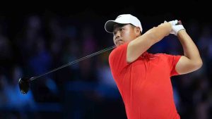 Tom Kim of Jupiter Links Golf Club hits on the fourth hole during a match of the TMRW Golf League (TGL) against Boston Common Golf, Monday, Jan. 27, 2025, in Palm Beach Gardens, Fla. (Rebecca Blackwell/AP)