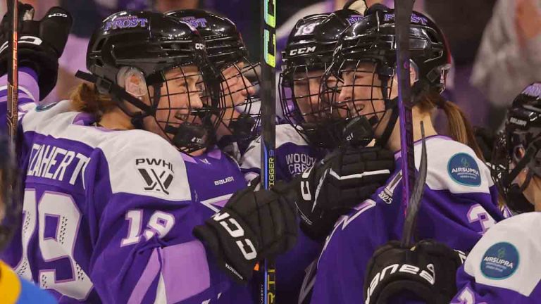 From left to right, Minnesota Frost's Maggie Flaherty, Kelly Pannek and Grace Zumwinkle help Brooke McQuigge (3) celebrate after her first goal against the Toronto Sceptres in the first period of a PWHL hockey playoff game in Sunday, May 11, 2025, in St. Paul, Minn. (Bruce Kluckhohn/AP)