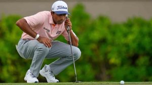 Sudarshan Yellamaraju, of Canada, putts on the 16th hole during the fourth round of the Sony Open golf event at the Waialae Country Club in Honolulu, Sunday, Jan. 18, 2026. (Matt York/AP)