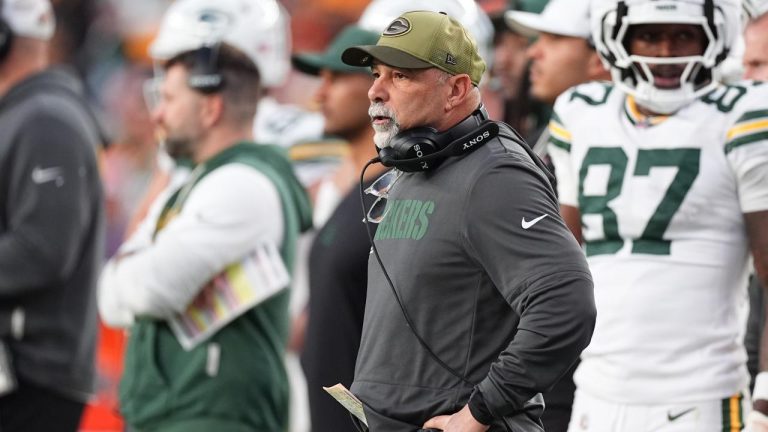 Green Bay Packers special teams coordinator Rich Bisaccia stands on the sideline in the second half of an NFL football game Dec. 14, 2025, in Denver. (David Zalubowski/AP)