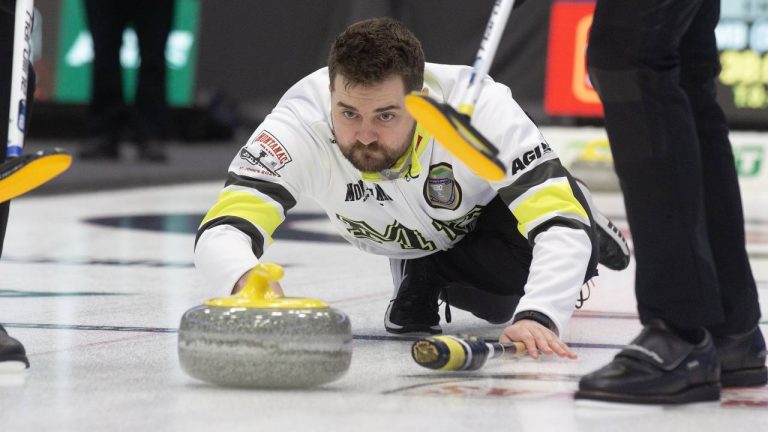 Team Manitoba Skip, Matthew Dunstone releases a stone during Draw 2 at the 2026 Brier in John's NL on Saturday Feb. 28, 2026. THE CANADIAN PRESS/Paul Daly