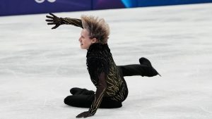 Ilia Malinin of the United States falls during the men's free skate program in figure skating at the Winter Olympics, in Milan, Italy, Feb. 13, 2026. (Natacha Pisarenko/AP)