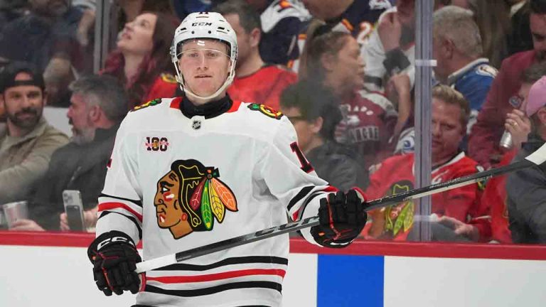 Chicago Blackhawks center Oliver Moore (11) in the second period of an NHL hockey game Saturday, Feb. 28, 2026, in Denver. (David Zalubowski/AP)