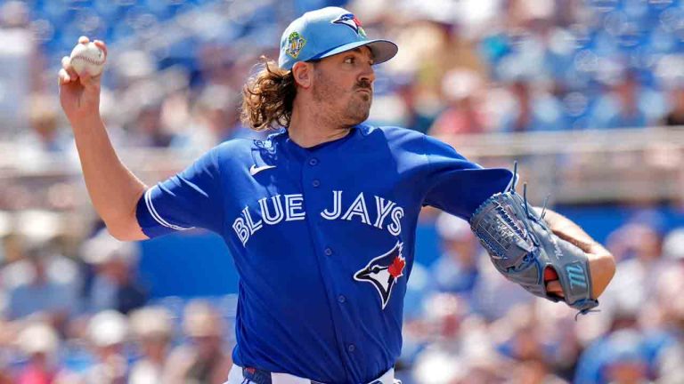 Toronto Blue Jays pitcher Kevin Gausman (34) pitches to Canada during the first inning of an exhibition baseball game Tuesday, March 3, 2026, in Dunedin, Fla. (Chris O'Meara/AP)