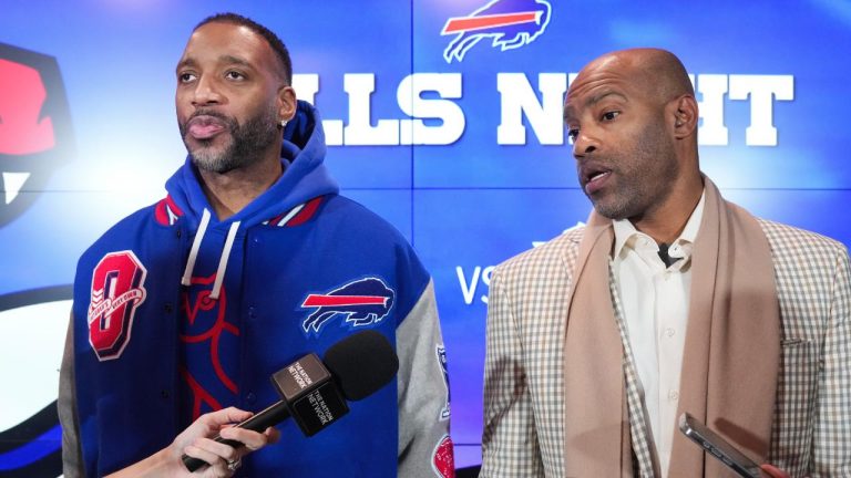 Tracy McGrady, left, and Vince Carter speak to the media regarding their minority ownership in the Buffalo Bills in Toronto on Tuesday, March 3, 2026. (Nathan Denette/CP)