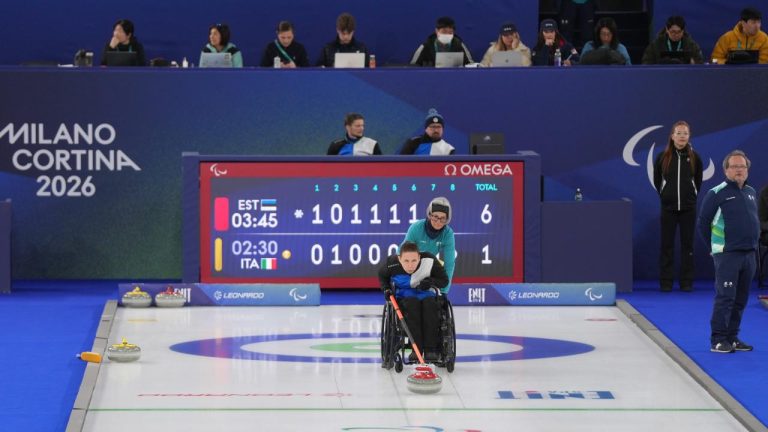 Katlin Riidebach, of Estonia, competes in a wheelchair curling mixed doubles round robin session against Italy at the 2026 Winter Paralympics, in Cortina d'Ampezzo, Italy, Thursday, March 5, 2026. (Evgeniy Maloletka/AP)