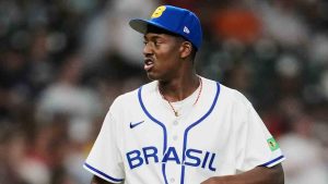 Brazil pitcher Joseph Contreras reacts after United States' Brice Turang hit a double during the second inning of a World Baseball Classic game, Friday, March 6, 2026, in Houston. (Ashley Landis/AP)