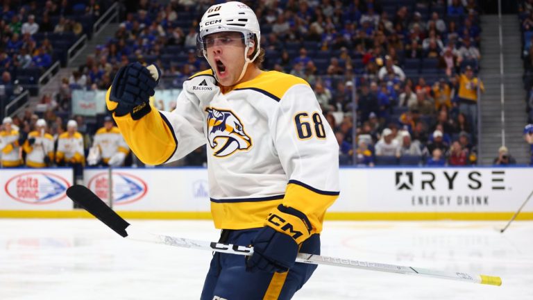 Nashville Predators left wing Zachary L'heureux (68) celebrates his goal during the second period of an NHL hockey game against the Buffalo Sabres, Saturday, March 7, 2026, in Buffalo, N.Y. (AP Photo/Jeffrey T. Barnes)