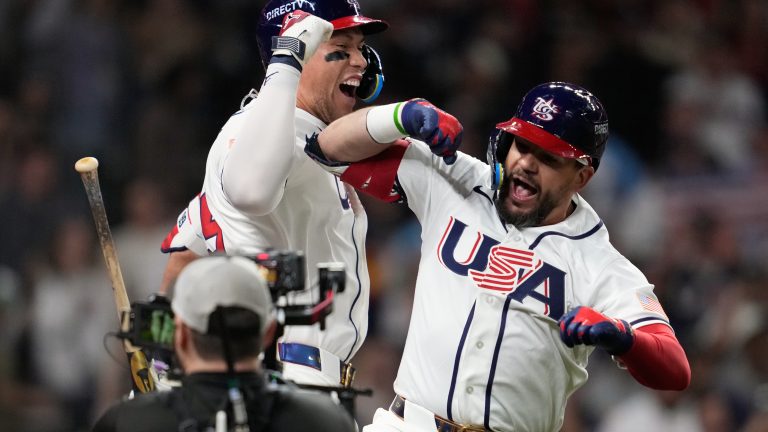 United States designated hitter Kyle Schwarber, right, celebrates with Aaron Judge after hitting a home run during the fifth inning of a World Baseball Classic game against Britain, Saturday, March 7, 2026, in Houston. (AP Photo/Ashley Landis)