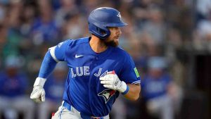 Toronto Blue Jays' Nathan Lukes runs to first after his single off New York Yankees pitcher Cam Schlittler during the fourth inning of a spring training baseball game Wednesday, March 11, 2026, in Tampa, Fla. (Chris O'Meara/AP)