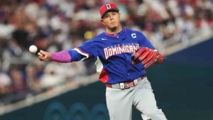 Dominican Republic third baseman Manny Machado throws to first base to get out Venezuela's Andres Gimenez during the eighth inning of a World Baseball Classic game, Wednesday, March 11, 2026, in Miami. (Lynne Sladky/AP)