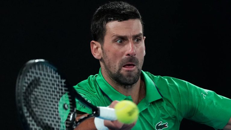 Novak Djokovic of Serbia plays a forehand return to Carlos Alcaraz of Spain during the men's singles final at the Australian Open tennis championship in Melbourne, Australia, Feb. 1, 2026. (Aaron Favila/AP)