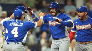 Venezuela designated hitter Eugenio Suárez celebrates after hitting a home run during the fourth inning of a World Baseball Classic semifinal game against Italy, Monday, March 16, 2026, in Miami. (Rebecca Blackwell/AP)
