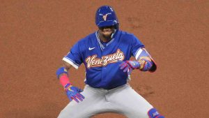 Venezuela Ronald Acuña Jr., gestures after reaching first base during the first inning in the championship game of the World Baseball Classic against the United States, Tuesday, March 17, 2026, in Miami. (Lynne Sladky/AP)