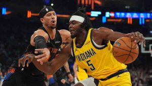 New York Knicks' Josh Hart, left, defends Indiana Pacers' Jarace Walker during the first half of an NBA basketball game Tuesday, March 17, 2026, in New York. (Frank Franklin II/AP)