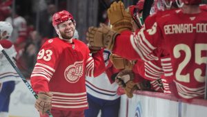 Detroit Red Wings right wing Alex DeBrincat (93) celebrates his goal against the MontrÈal Canadiens in the third period of an NHL hockey game Thursday, March 19, 2026, in Detroit. (Paul Sancya/AP)