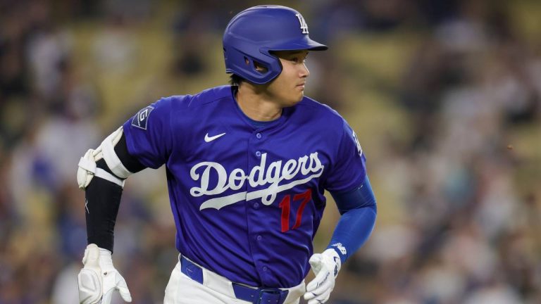 Los Angeles Dodgers designated hitter Shohei Ohtani runs after hitting a double during the third inning of a spring training baseball game against the Los Angeles Angels, Monday, March 23, 2026, in Los Angeles. (Ryan Sun/AP)