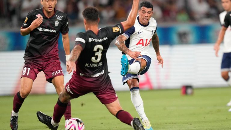 Tottenham's Pedro Porro makes a goal against Vissel Kobe's Matheus Thuler during the first half of a friendly soccer match in Tokyo, Saturday, July 27, 2024. (Hiro Komae/AP)
