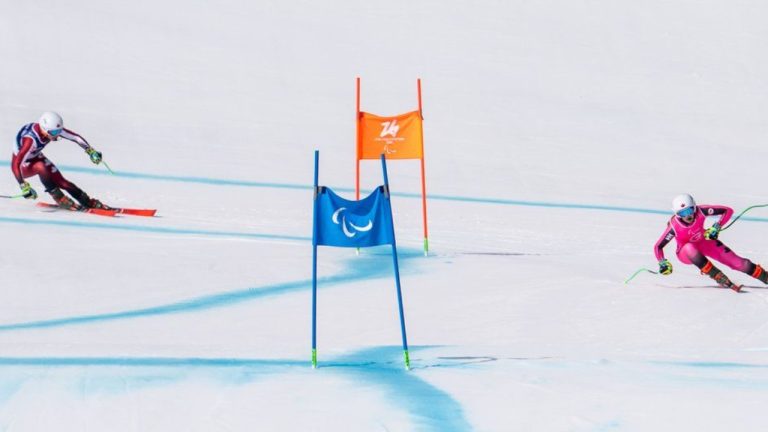 Kalle Eriksson and Sierra Smith ski to the bronze medal in the Men’s Super G VI at the 2026 Paralympic Games in Cortina, Italy on Monday March 9, 2026 (CP/Handout – CANADIAN PARALYMPIC COMMITTEE/Dave Holland)