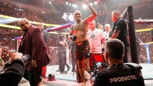 Charles Oliveira leaves the Octagon after defeating Max Holloway in a lightweight fight at UFC 326 in Las Vegas. (Steve Marcus/Las Vegas Sun via AP)
