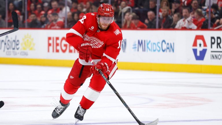 Detroit Red Wings center Andrew Copp (18) moves the puck against the San Jose Sharks during the first period of an NHL hockey game Friday, Jan. 16, 2026, in Detroit. (Duane Burleson/AP)