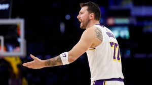 Los Angeles Lakers guard Luka Doncic (77) reacts to a call during the first half of an NBA basketball game against the New York Knicks, Sunday, March 8, 2026, in Los Angeles. (Caroline Brehman/AP)