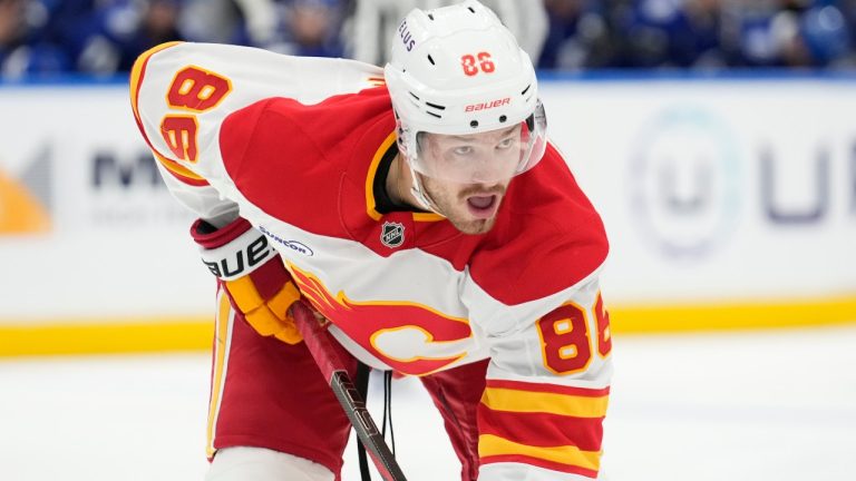 Calgary Flames left wing Joel Farabee (86) against the Tampa Bay Lightning during the third period of an NHL hockey game Wednesday, Nov. 26, 2025, in Tampa, Fla. (Chris O'Meara/AP)