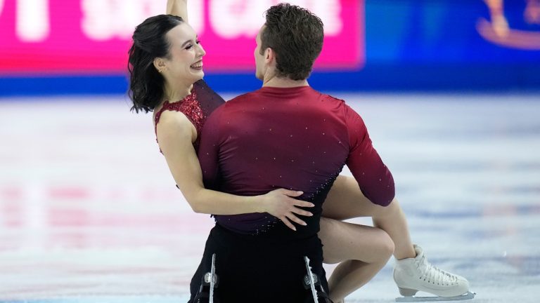 Lia Pereira and Trennt Michaud from Canada perform during the pairs short program at the Figure Skating World Championships in Prague, Czech Republic, Wednesday, March 25, 2026. (AP Photo/Petr David Josek)