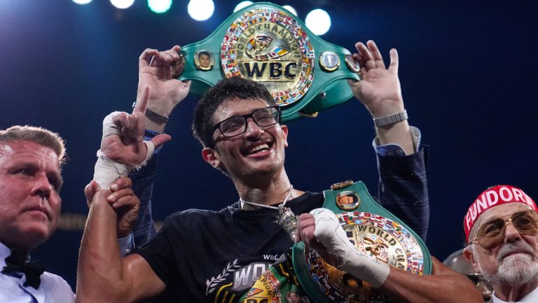 Sebastian Fundora poses with his belts after defeating Keith Thurman in a super welterweight championship boxing match Saturday, March 28, 2026, in Las Vegas. (John Locher/AP)