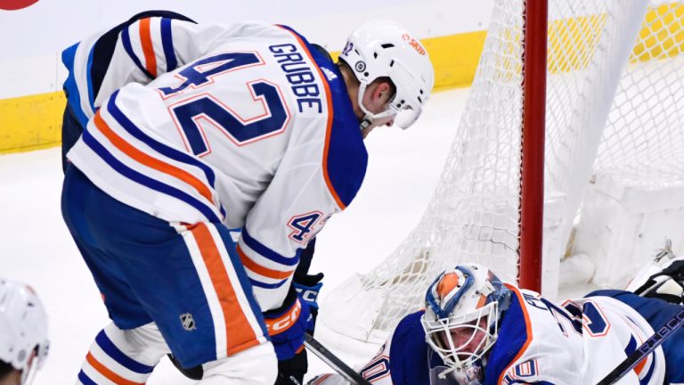 Edmonton Oilers' goaltender Calvin Pickard (30) makes a save on Winnipeg Jets' Daniel Torgersson (40) as Jayden Grubbe (42) defends during third period NHL pre-season action in Winnipeg on Monday, September 25, 2023. (Fred Greenslade/CP