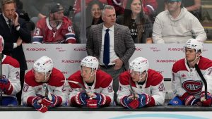 Montreal Canadiens head coach Martin St. Louis, middle, watches from the bench during the third period of an NHL hockey game against the San Jose Sharks in San Jose, Calif., Tuesday, March 3, 2026. (Jeff Chiu/AP)
