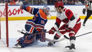 Carolina Hurricanes' Seth Jarvis (24) is stopped by Edmonton Oilers goalie Tristan Jarry (35) during third period NHL action, in Edmonton on Friday, March 6, 2026. (Jason Franson/CP)