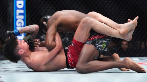 Ignacio-Bahamondes-throws-an-elbow-from-bottom-position-during-a-UFC-lightweight-bout
