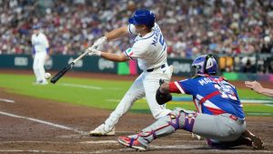 Italy's Jakob Marsee singles during the second inning of a World Baseball Classic quarterfinal game against Puerto Rico, Saturday, March 14, 2026, in Houston. (Karen Warren/AP)