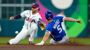 Italy center fielder Jakob Marsee (5) steals second under United States shortstop Bobby Witt Jr. (7) in the third inning of a World Baseball Classic game, Tuesday, March 10, 2026, in Houston. (Ashley Landis/AP)