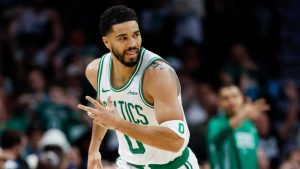 Boston Celtics forward Jayson Tatum reacts after making a three-point basket against the Charlotte Hornets during the first half of an NBA basketball game in Charlotte, N.C., Sunday, March 29, 2026. (Nell Redmond/AP)