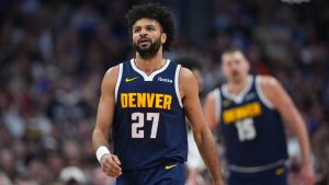 Denver Nuggets guard Jamal Murray reacts after hitting a basket and drawing a foul in the first half of an NBA basketball game against the Dallas Mavericks Wednesday, March 25, 2026, in Denver. (David Zalubowski/AP)
