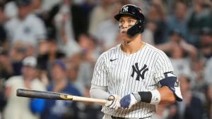 New York Yankees' Aaron Judge watches after connecting for a three-run home run against the Toronto Blue Jays during the fourth inning of Game 3 of baseball's American League Division Series, Tuesday, Oct. 7, 2025, in New York. (Yuki Iwamura/AP)