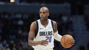 Dallas Mavericks forward Khris Middleton brings the ball down court against the Charlotte Hornets during the second half of an NBA basketball game, Tuesday, March 3, 2026, in Charlotte, N.C. (AP Photo/Chris Carlson)